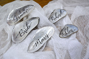 Calligraphy Mussel Shell & Mini Bottle Name Place Cards Featured on Emmaline Bride!